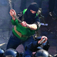 Последнее заседание Верховной рады Украины завершилось под аккомпанемент массовых беспорядков у стен парламента.