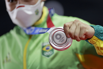 Разница в десятки медалей: насколько аналитики смогли предугадать итоги Олимпиады